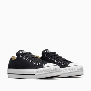 Women’s all star converse with platform in black size 8.